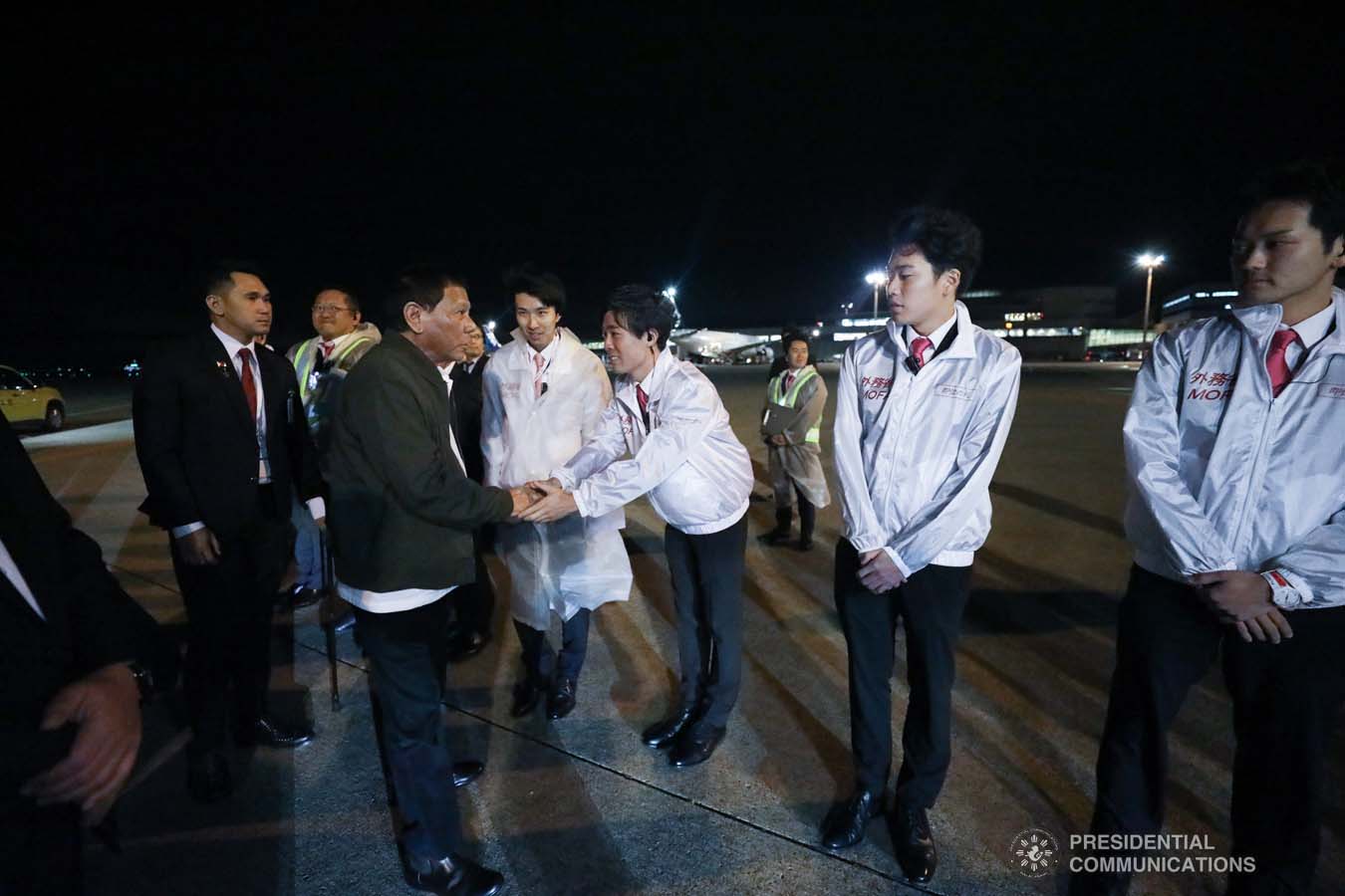 President Rodrigo Roa Duterte bids farewell to one of the members of the send-off party before his departure at the Haneda International Airport in Tokyo, Japan on October 22, 2019. The President attended the Ceremonies of the Accession to the Throne of His Majesty Emperor Naruhito. SIMEON CELI JR./PRESIDENTIAL PHOTO
