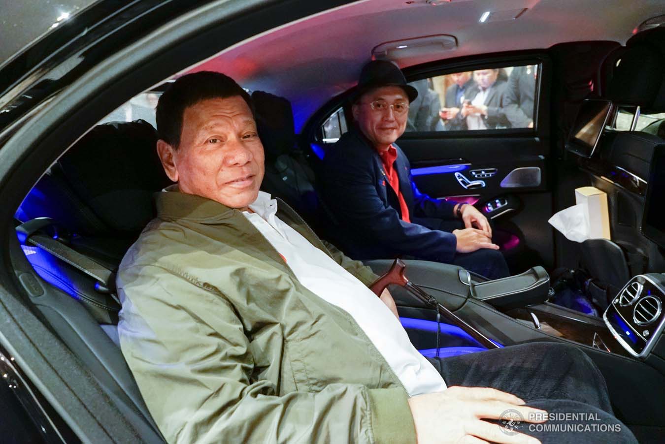 President Rodrigo Roa Duterte and Senator Christopher "Bong" Go pose for posterity while on board a vehicle going to the Haneda International Airport following the President's attendance to the Ceremonies of the Accession to the Throne of His Majesty Emperor Naruhito at the Imperial Palace on October 22, 2019. KING RODRIGUEZ/PRESIDENTIAL PHOTO