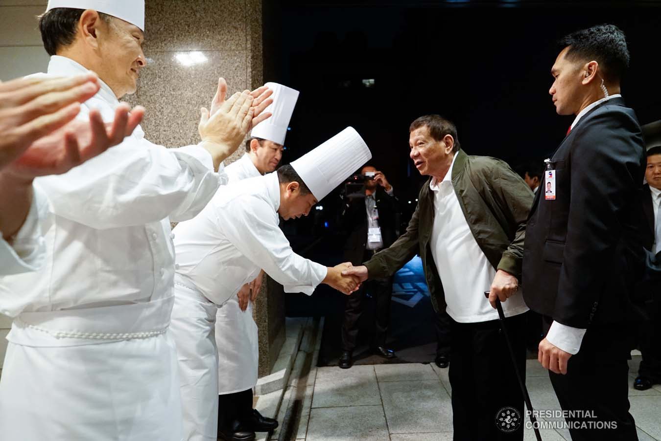 President Rodrigo Roa Duterte bids farewell to one of the chefs of a hotel in Tokyo, Japan before heading to the Haneda International Airport following his attendance to the Ceremonies of the Accession to the Throne of His Majesty Emperor Naruhito at the Imperial Palace on October 22, 2019. KING RODRIGUEZ/PRESIDENTIAL PHOTO