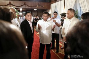 President Rodrigo Roa Duterte discusses matters with newly appointed Supreme Court Chief Justice Diosdado Peralta following the oath-taking ceremony at the Malacañan Palace on October 24, 2019. Also in the photo is Senator Christopher "Bong" Go. KARL NORMAN ALONZO/PRESIDENTIAL PHOTO