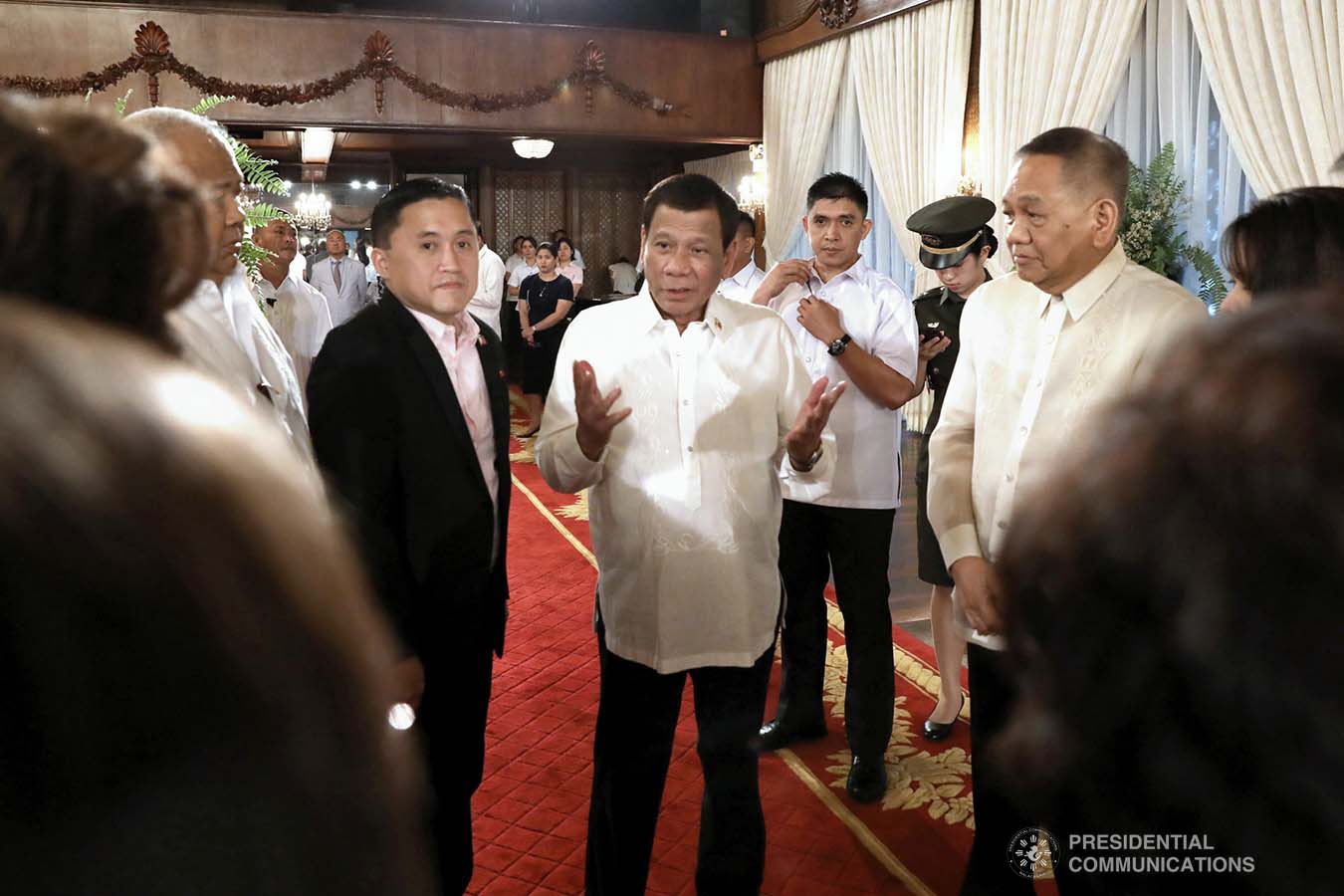 President Rodrigo Roa Duterte discusses matters with newly appointed Supreme Court Chief Justice Diosdado Peralta following the oath-taking ceremony at the Malacañan Palace on October 24, 2019. Also in the photo is Senator Christopher "Bong" Go. KARL NORMAN ALONZO/PRESIDENTIAL PHOTO