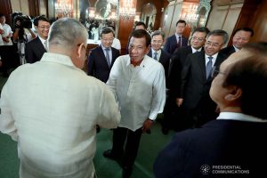 President Rodrigo Roa Duterte greets some members of the cabinet during the courtesy call of Vice Premier of the People's Republic of China Hu Chunhua at the Malacañan Palace on October 24, 2019. RICHARD MADELO/PRESIDENTIAL PHOTO