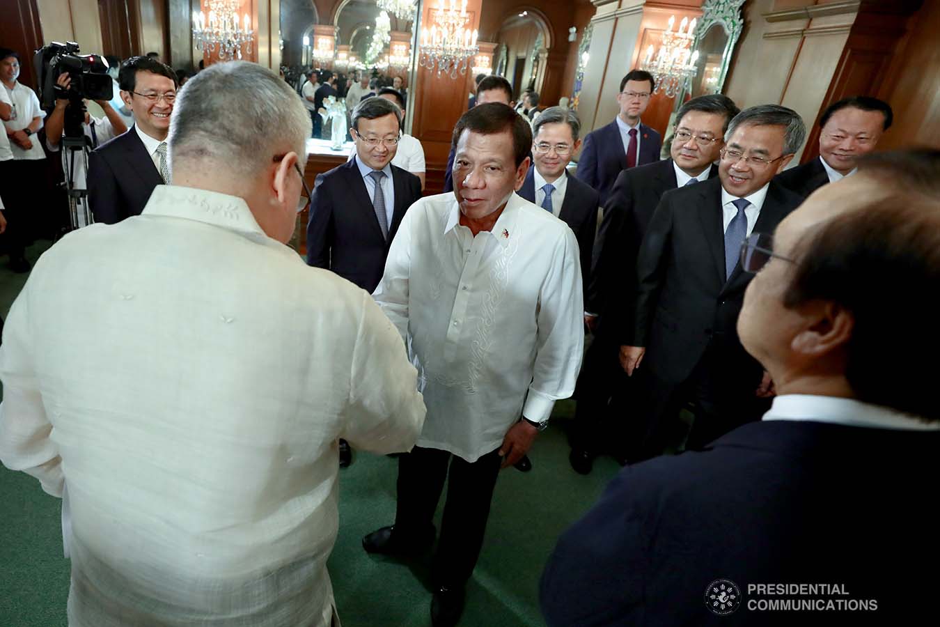 President Rodrigo Roa Duterte greets some members of the cabinet during the courtesy call of Vice Premier of the People's Republic of China Hu Chunhua at the Malacañan Palace on October 24, 2019. RICHARD MADELO/PRESIDENTIAL PHOTO