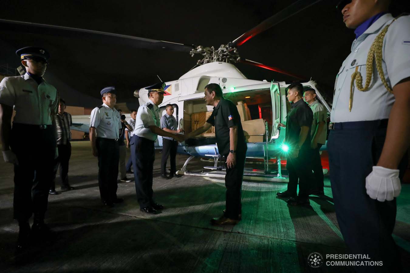 President Rodrigo Roa Duterte greets an officer from the Philippine Air Force at the Villamor Air Base in Pasay City on November 4, 2019 following his successful participation in the 35th Association of Southeast Asian Nations (ASEAN) Summit and Related Summits in the Kingdom of Thailand. ROBINSON NIÑAL JR./PRESIDENTIAL PHOTO