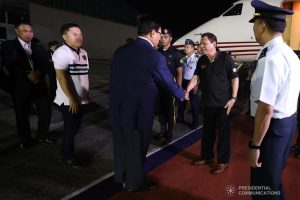President Rodrigo Roa Duterte is welcomed back by National Security Adviser Hermogenes Esperon Jr. upon his arrival at the Villamor Air Base in Pasay City on November 4, 2019 following his successful participation in the 35th Association of Southeast Asian Nations (ASEAN) Summit and Related Summits in the Kingdom of Thailand. ROBINSON NIÑAL JR./PRESIDENTIAL PHOTO