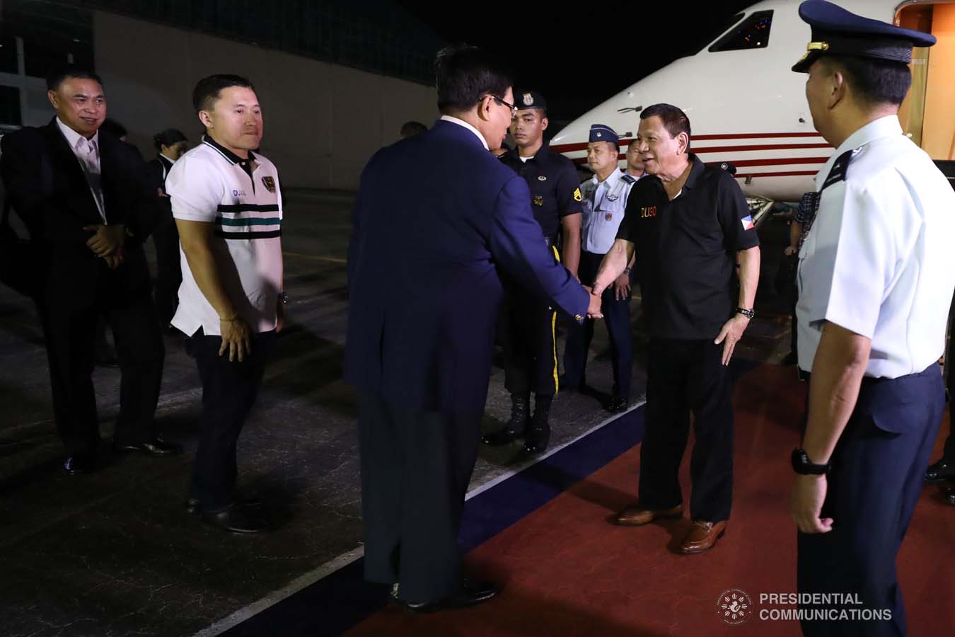 President Rodrigo Roa Duterte is welcomed back by National Security Adviser Hermogenes Esperon Jr. upon his arrival at the Villamor Air Base in Pasay City on November 4, 2019 following his successful participation in the 35th Association of Southeast Asian Nations (ASEAN) Summit and Related Summits in the Kingdom of Thailand. ROBINSON NIÑAL JR./PRESIDENTIAL PHOTO