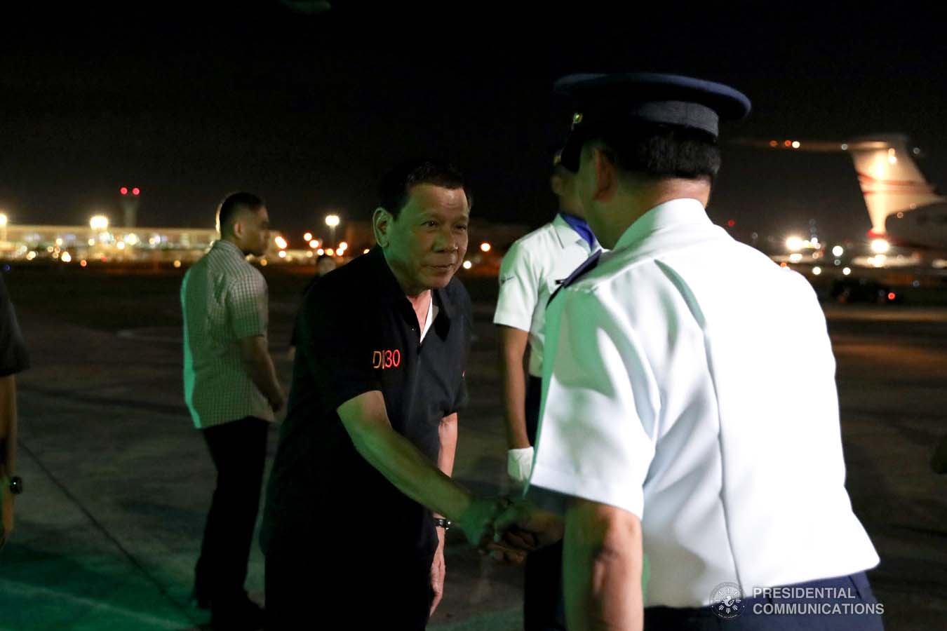 President Rodrigo Roa Duterte greets an officer from the Philippine Air Force at the Villamor Air Base in Pasay City on November 4, 2019 following his successful participation in the 35th Association of Southeast Asian Nations (ASEAN) Summit and Related Summits in the Kingdom of Thailand. KARL NORMAN ALONZO/PRESIDENTIAL PHOTO