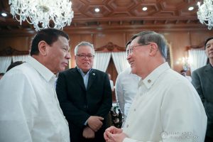 President Rodrigo Roa Duterte shares a light moment with Trade and Industry Secretary Ramon Lopez and Finance Secretary Carlos Dominguez III prior to the start of the 43rd Cabinet Meeting at the Malacañan Palace on November 6, 2019. ACE MORANDANTE/PRESIDENTIAL PHOTO