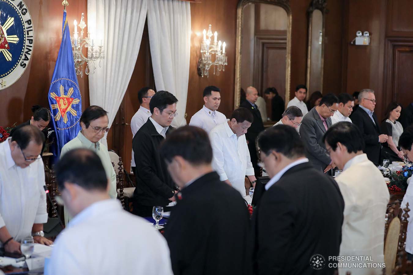 President Rodrigo Roa Duterte joins the members of the cabinet as they bow their heads in prayer prior to the start of the 43rd Cabinet Meeting at the Malacañan Palace on November 6, 2019. ALFRED FRIAS/PRESIDENTIAL PHOTO