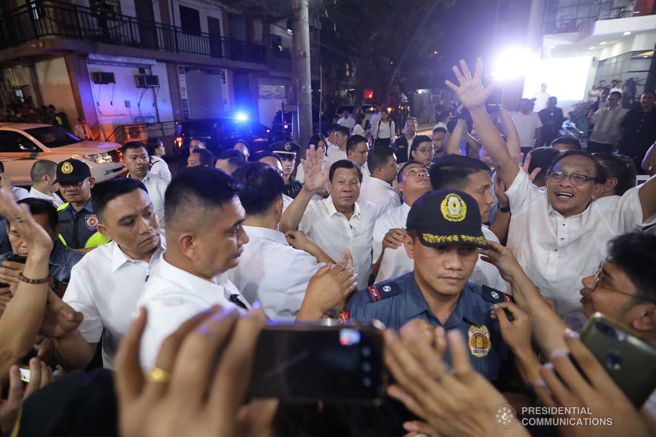 President Rodrigo Roa Duterte interacts with his supporters upon his arrival at the Taguig City Center for the Elderly on November 21, 2019. ALFRED FRIAS/PRESIDENTIAL PHOTO