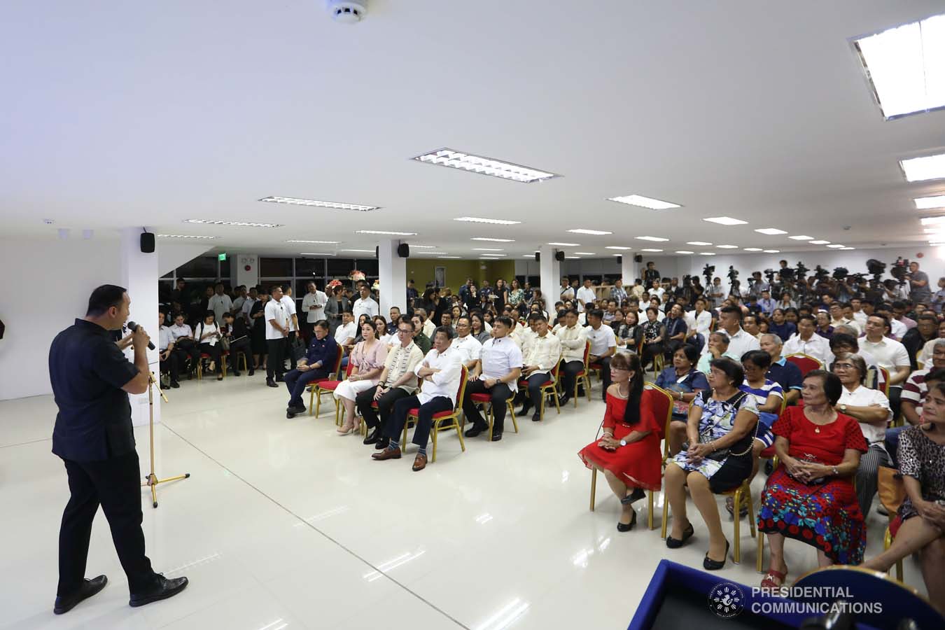 President Rodrigo Roa Duterte listens to the welcome remarks of Taguig City Mayor Lino Cayetano during the President's visit to the Taguig City Center for the Elderly on November 21, 2019. ALFRED FRIAS/PRESIDENTIAL PHOTO