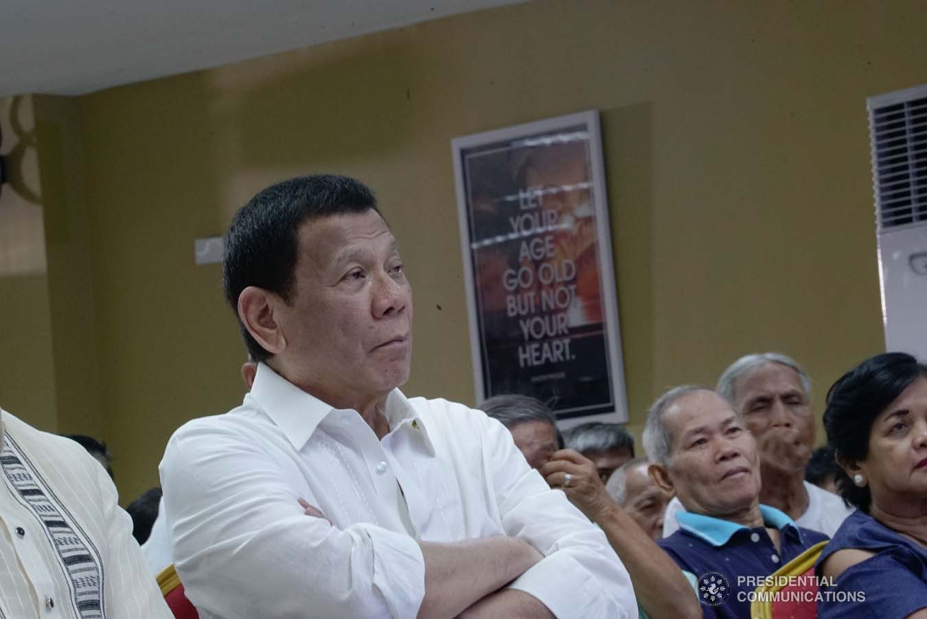 President Rodrigo Roa Duterte listens to the welcome remarks of Taguig City Mayor Lino Cayetano during the President's visit to the Taguig City Center for the Elderly on November 21, 2019. KING RODRIGUEZ/PRESIDENTIAL PHOTO