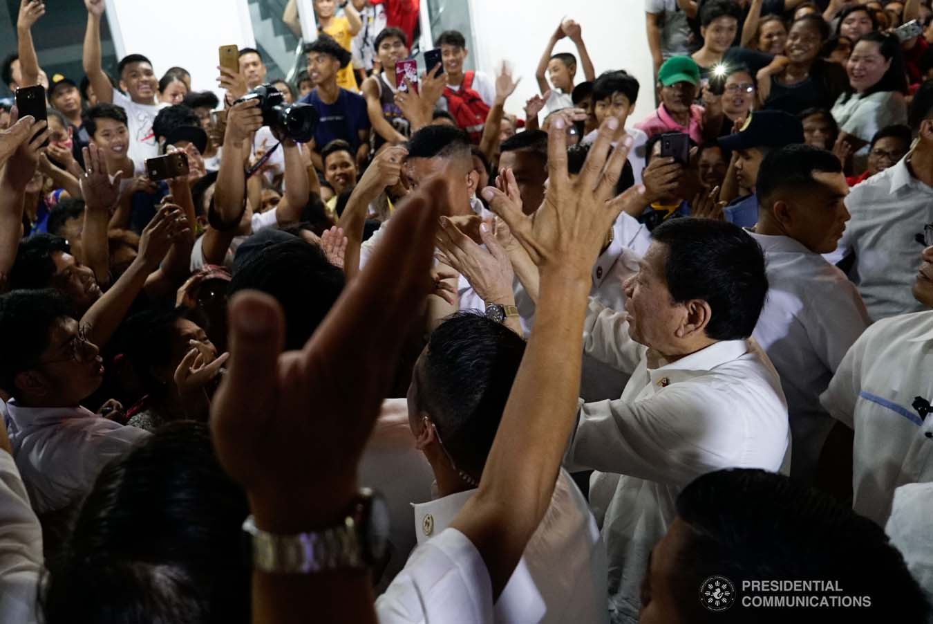President Rodrigo Roa Duterte interacts with his supporters upon his arrival at the Taguig City Center for the Elderly on November 21, 2019. KING RODRIGUEZ/PRESIDENTIAL PHOTO