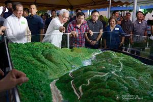 President Rodrigo Roa Duterte inspects the scale model of the Siguil Hydro Power Corporation's 14.5-Megawatt Hydropower Project during its launch in Maasim, Sarangani Province on November 22, 2019. JOEY DALUMPINES/PRESIDENTIAL PHOTO