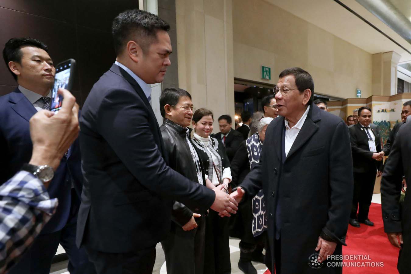 President Rodrigo Roa Duterte is welcomed by Presidential Communications Operations Office Secretary Martin Andanar and other members of the Philippine delegation upon his arrival at a hotel in Busan, Republic of Korea on November 25, 2019. ROBINSON NIÑAL JR./PRESIDENTIAL PHOTO