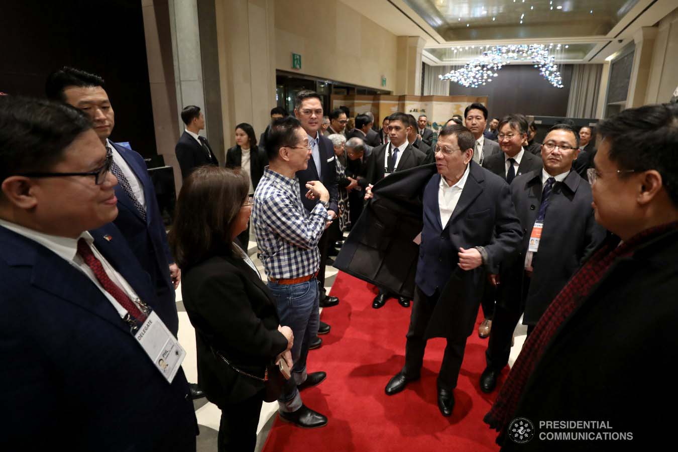 President Rodrigo Roa Duterte is welcomed by Presidential Chief Legal Counsel and Spokesperson Salvador Panelo and other members of the Philippine delegation upon his arrival at a hotel in Busan, Republic of Korea on November 25, 2019. ROBINSON NIÑAL JR./PRESIDENTIAL PHOTO
