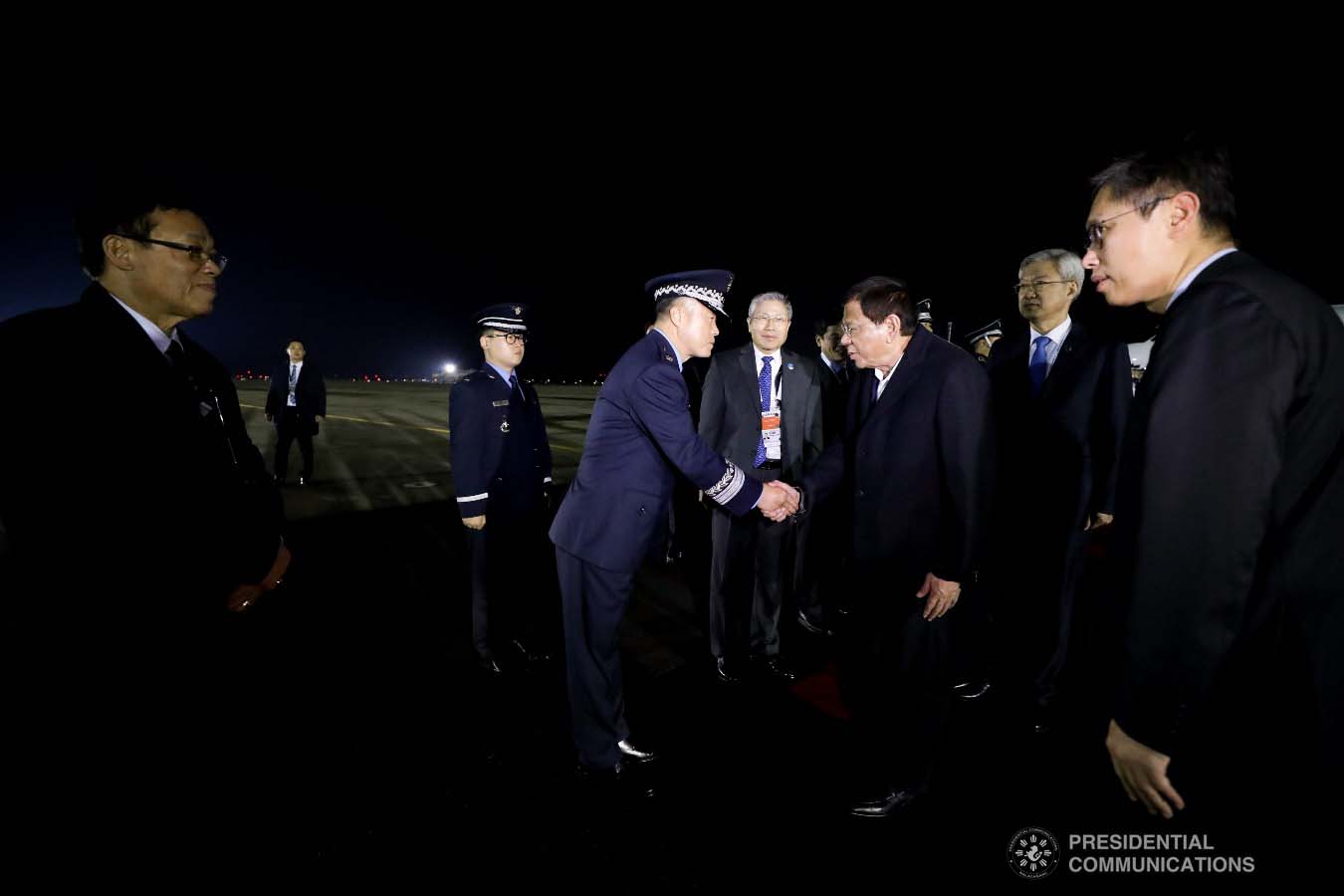 President Rodrigo Roa Duterte receives a warm welcome from the members of the reception party upon his arrival at the Gimhae Air Base in Busan, Republic of Korea on November 25, 2019. KARL NORMAN ALONZO/PRESIDENTIAL PHOTO
