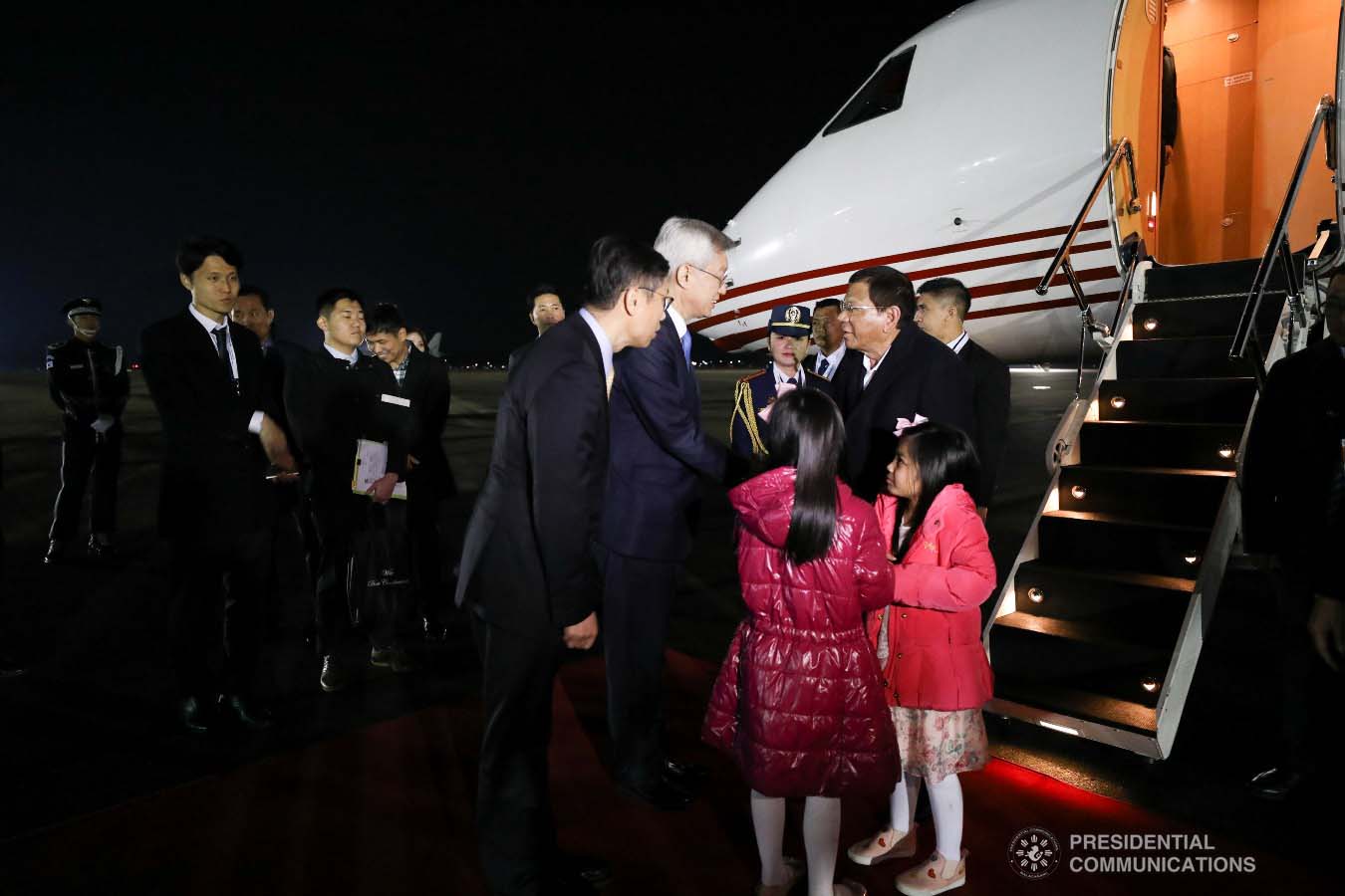 President Rodrigo Roa Duterte receives a warm welcome from the members of the reception party upon his arrival at the Gimhae Air Base in Busan, Republic of Korea on November 25, 2019. KARL NORMAN ALONZO/PRESIDENTIAL PHOTO