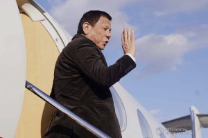 President Rodrigo Roa Duterte waves at the members of the send-off party as he departs for Manila at the Gimhae Air Base in Busan, Republic of Korea on November 26, 2019. ARMAN BAYLON/PRESIDENTIAL PHOTO