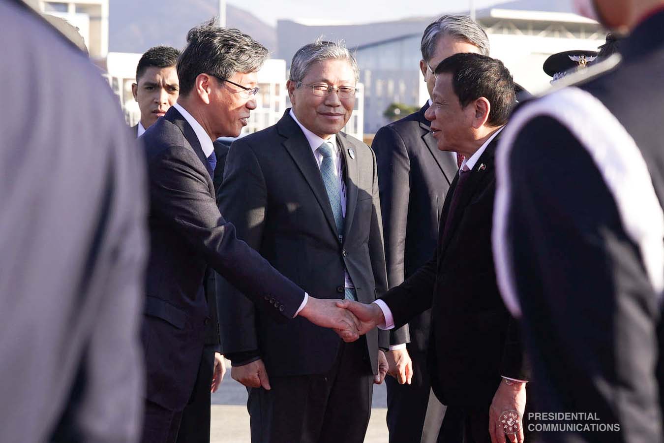 President Rodrigo Roa Duterte bids farewell to the members of the send-off party as he prepares to depart for Manila at the Gimhae Air Base in Busan, Republic of Korea on November 26, 2019. ARMAN BAYLON/PRESIDENTIAL PHOTO