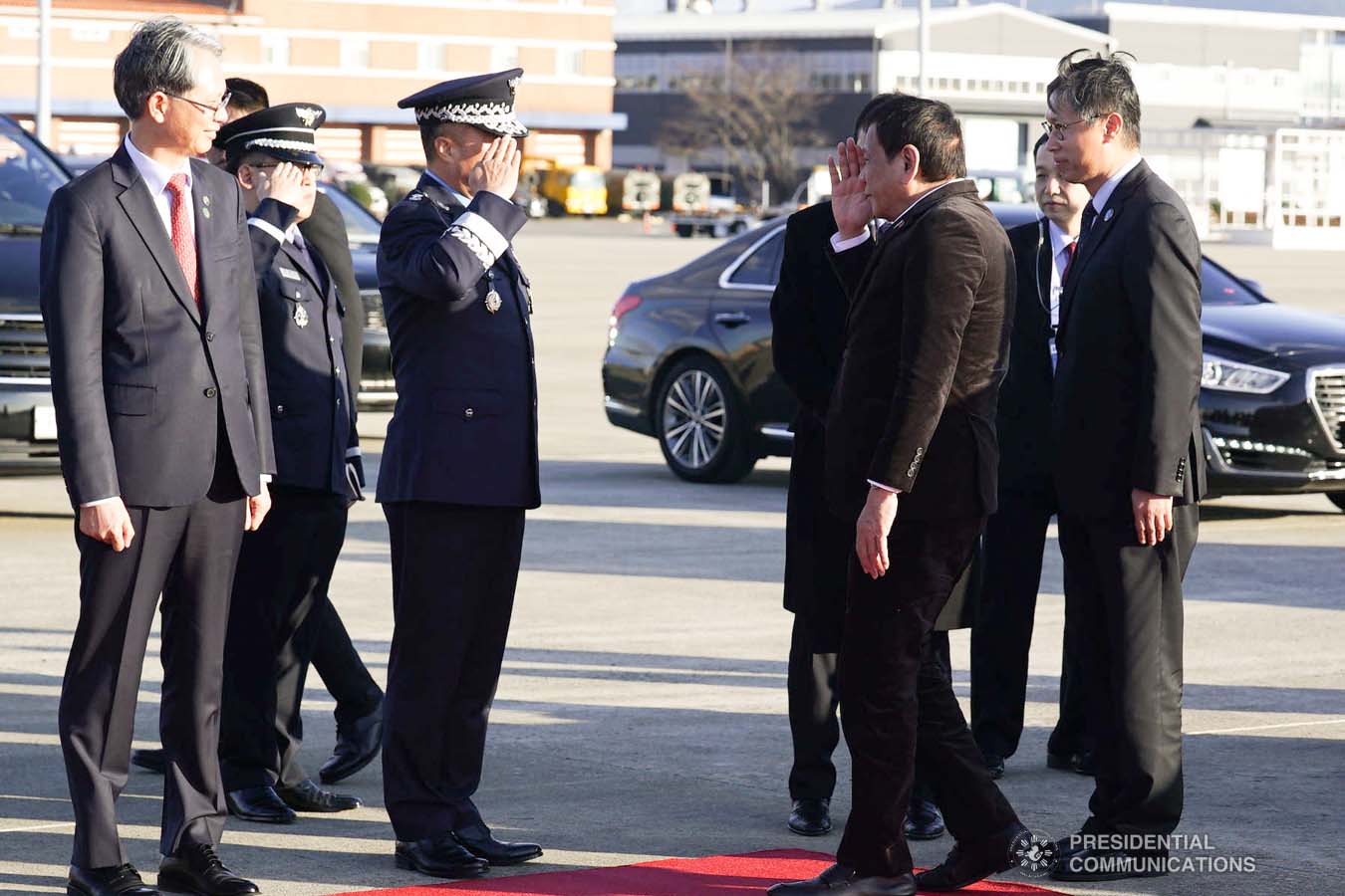 President Rodrigo Roa Duterte bids farewell to the members of the send-off party as he prepares to depart for Manila at the Gimhae Air Base in Busan, Republic of Korea on November 26, 2019. ARMAN BAYLON/PRESIDENTIAL PHOTO