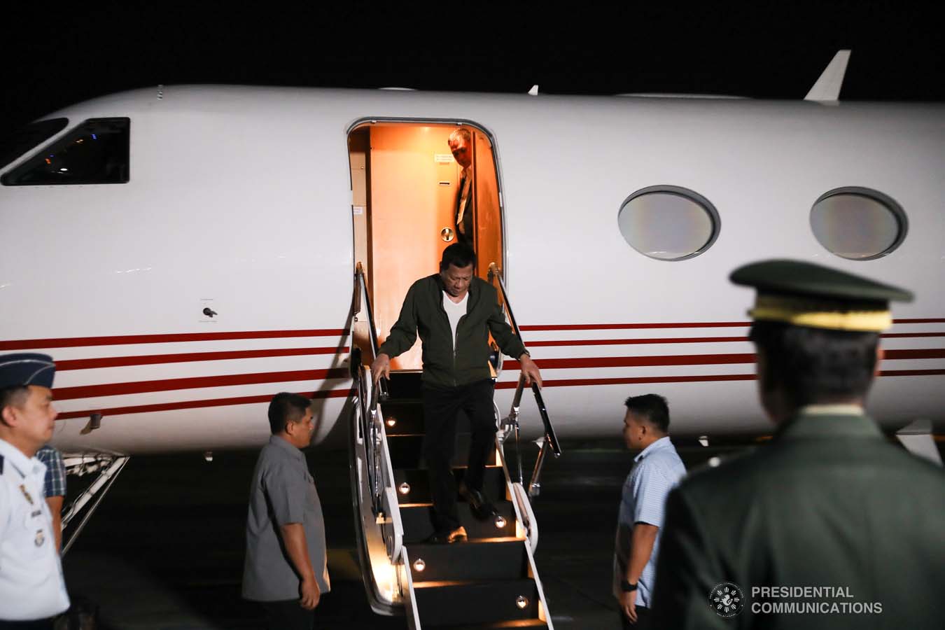 President Rodrigo Roa Duterte disembarks from a plane upon his arrival at the Villamor Air Base in Pasay City on November 26, 2019 after his successful participation in the Association of Southeast Asian Nations (ASEAN)-Republic of Korea Commemorative Summit in Busan. ALFRED FRIAS/PRESIDENTIAL PHOTO