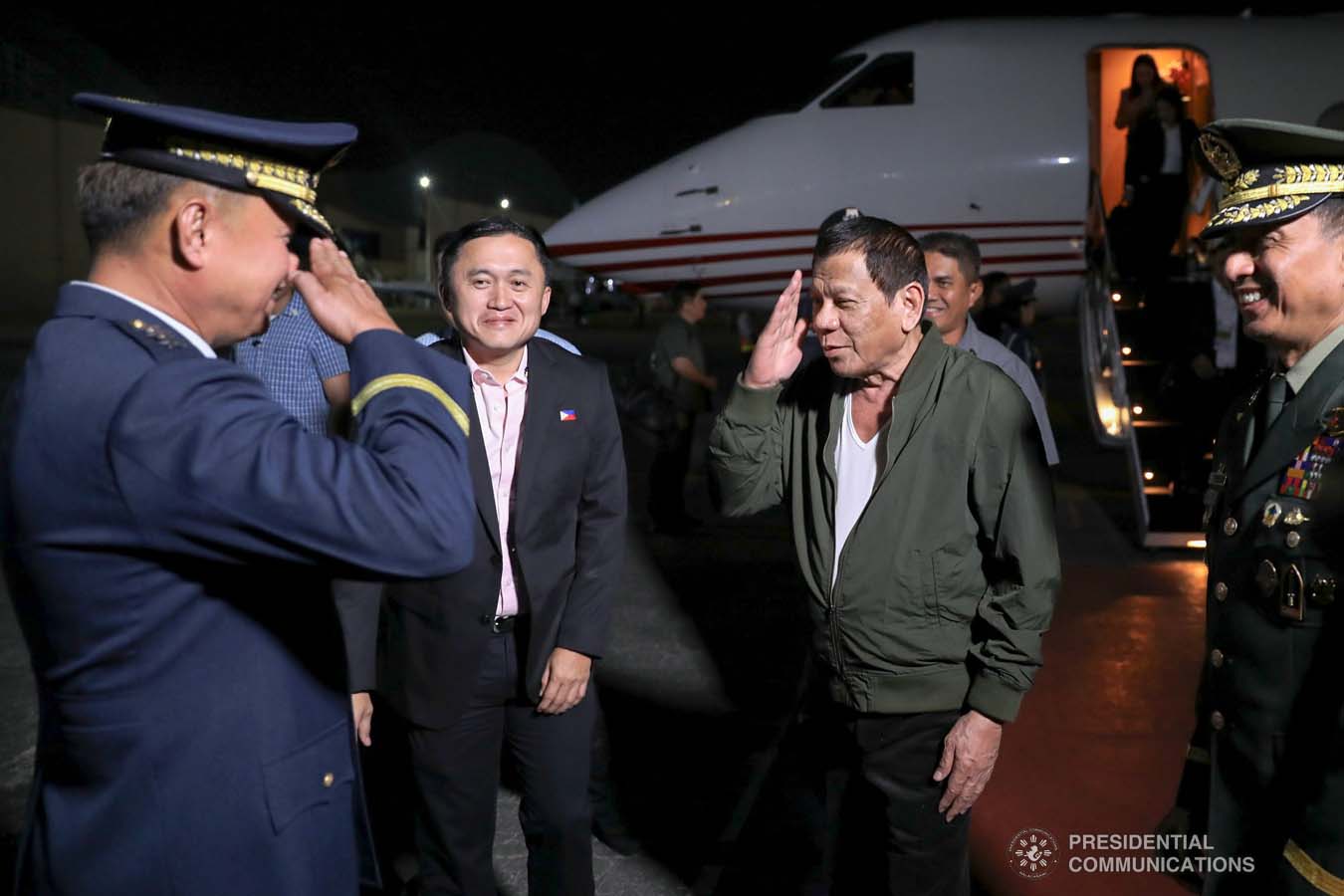 President Rodrigo Roa Duterte salutes a military officer upon his arrival at the Villamor Air Base in Pasay City on November 26, 2019 after his successful participation in the Association of Southeast Asian Nations (ASEAN)-Republic of Korea Commemorative Summit in Busan. ALFRED FRIAS/PRESIDENTIAL PHOTO