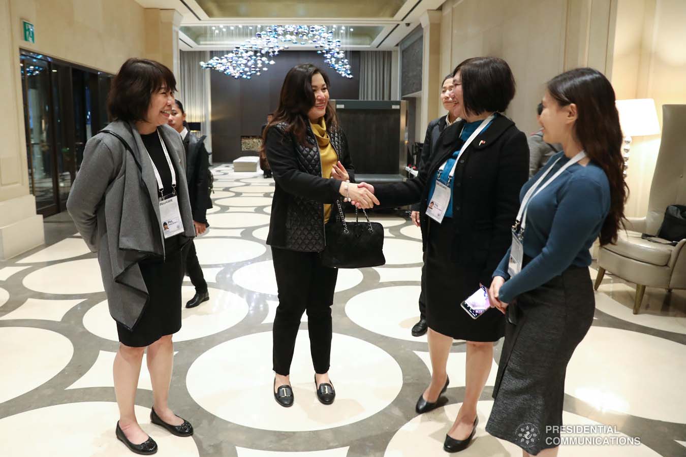 President Rodrigo Roa Duterte's partner Cielito Avanceña bids farewell to the send-off party as she prepares to leave for Manila after joining the President in various events during the Association of Southeast Asian Nations (ASEAN)-Republic of Korea Commemorative Summit in Busan on November 26, 2019. ROBINSON NIÑAL JR./PRESIDENTIAL PHOTO