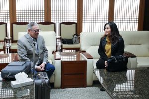 President Rodrigo Roa Duterte's partner Cielito Avanceña chats with Foreign Affairs Secretary Teodoro Locsin Jr. as she prepares to leave for Manila after joining the President in various events during the Association of Southeast Asian Nations (ASEAN)-Republic of Korea Commemorative Summit in Busan on November 26, 2019. RICHARD MADELO/PRESIDENTIAL PHOTO