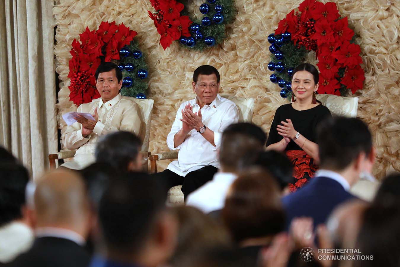 President Rodrigo Roa Duterte applauds while witnessing the program proper during the awarding ceremony for the 2018 Presidential Award for Child-Friendly Municipalities and Cities (PACFMC) at the Malacañan Palace on November 28, 2019. With the President are Social Welfare and Development Secretary Rolando Bautista and Council for the Welfare of Children (CWC) Executive Director Mary Uy. ACE MORANDANTE/PRESIDENTIAL PHOTO