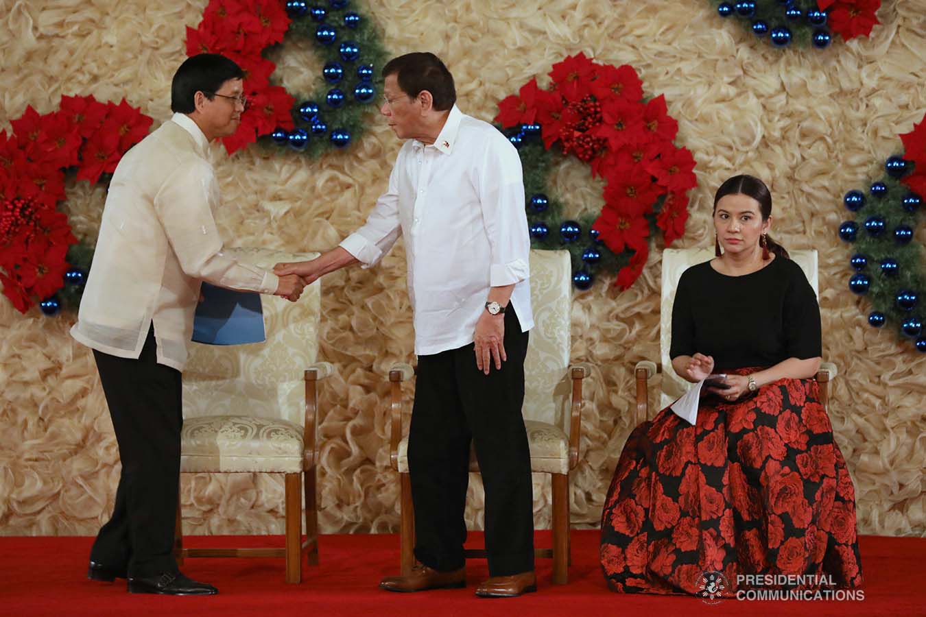 President Rodrigo Roa Duterte greets Social Welfare and Development Secretary Rolando Bautista after the latter gave his welcome remarks during the awarding ceremony for the 2018 Presidential Award for Child-Friendly Municipalities and Cities (PACFMC) at the Malacañan Palace on November 28, 2019. TOTO LOZANO/PRESIDENTIAL PHOTO