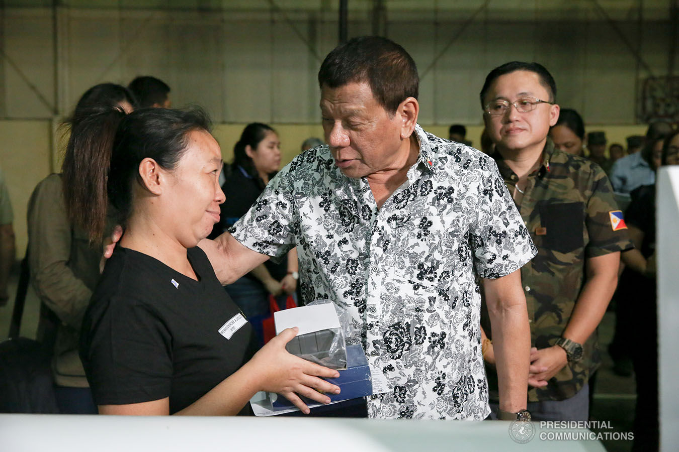 President Rodrigo Roa Duterte condoles with the kin of one of the slain soldiers he visited at Camp General Vicente Lukban in Catbalogan City in Samar on November 15, 2019. ALBERT ALCAIN/PRESIDENTIAL PHOTO