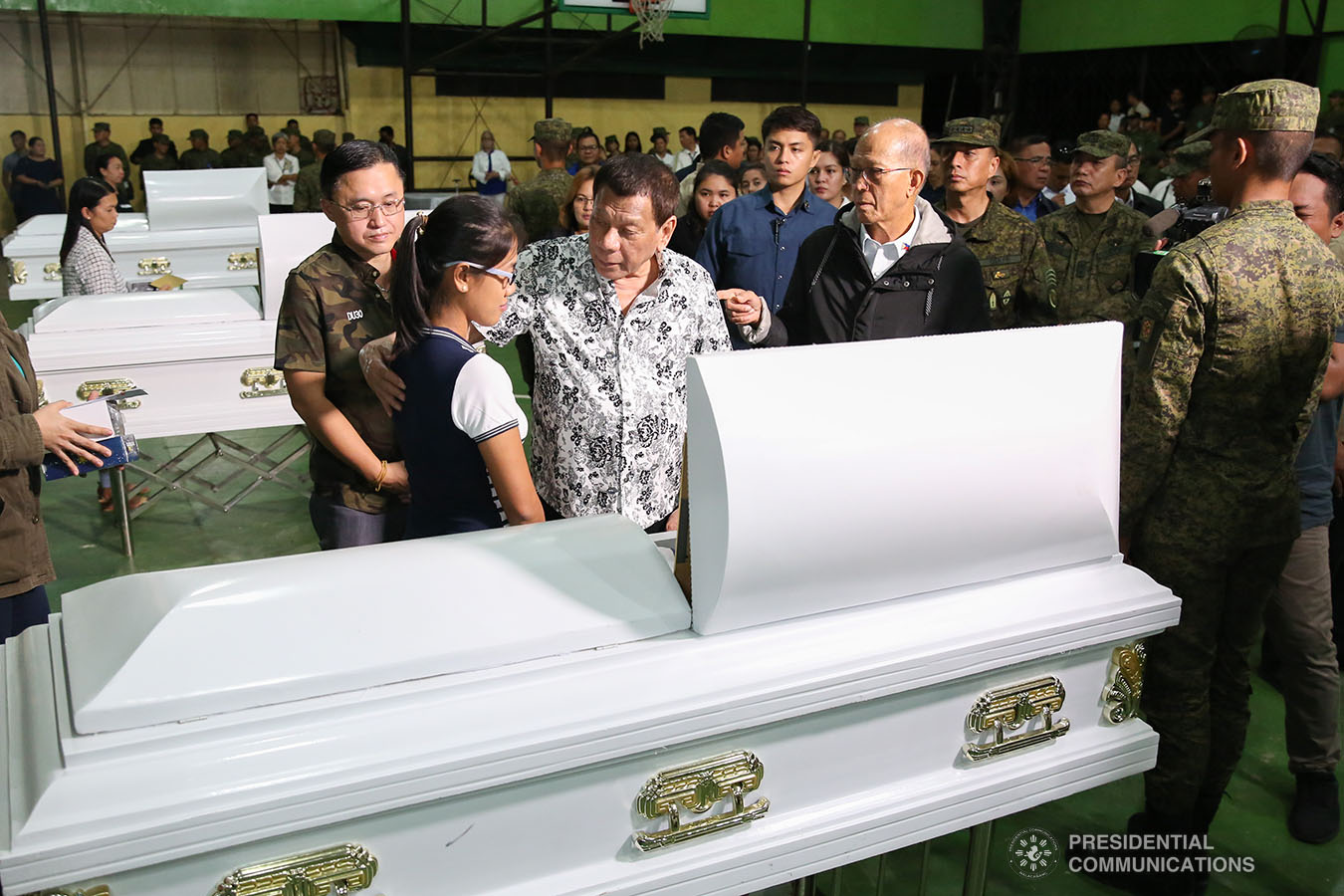 President Rodrigo Roa Duterte condoles with the kin of one of the slain soldiers he visited at Camp General Vicente Lukban in Catbalogan City in Samar on November 15, 2019. ALBERT ALCAIN/PRESIDENTIAL PHOTO