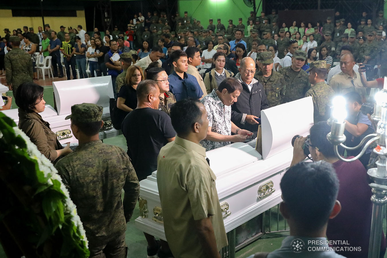 President Rodrigo Roa Duterte posthumously awards the Order of Lapu-Lapu Rank of Kalasag to one of the slain soldiers he visited at Camp General Vicente Lukban in Catbalogan City in Samar on November 15, 2019. ALFRED FRIAS/PRESIDENTIAL PHOTO