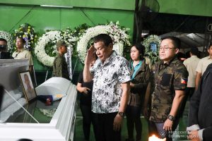 President Rodrigo Roa Duterte pays his last respects to one of the slain soldiers he visited at Camp General Vicente Lukban in Catbalogan City in Samar on November 15, 2019. ALBERT ALCAIN/PRESIDENTIAL PHOTO