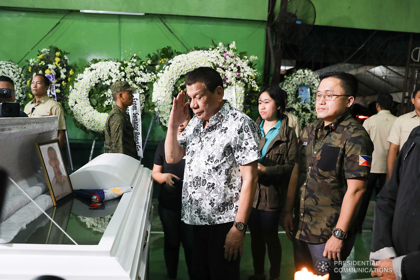 President Rodrigo Roa Duterte pays his last respects to one of the slain soldiers he visited at Camp General Vicente Lukban in Catbalogan City in Samar on November 15, 2019. ALBERT ALCAIN/PRESIDENTIAL PHOTO