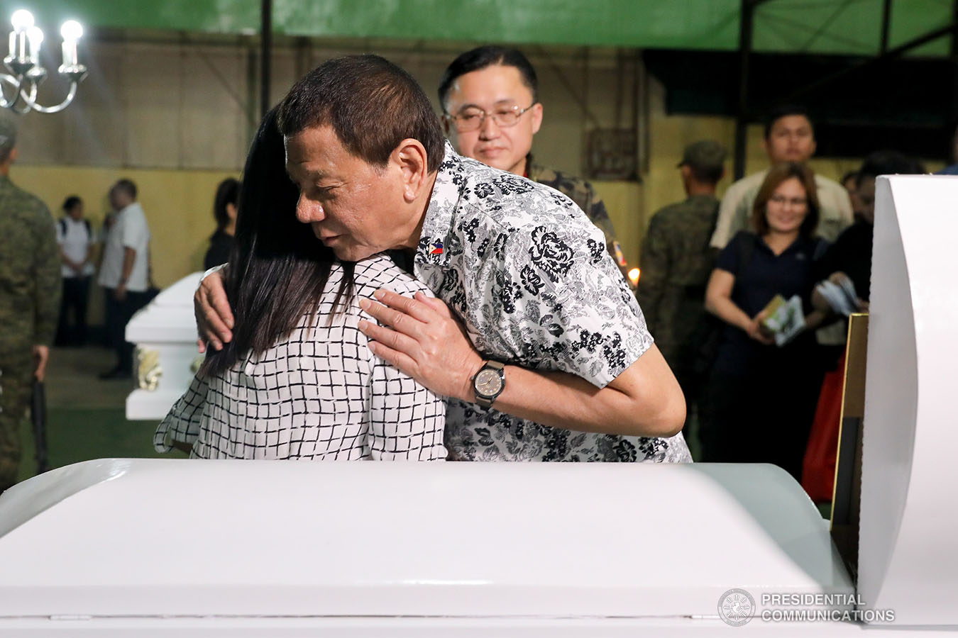 President Rodrigo Roa Duterte condoles with the kin of one of the slain soldiers he visited at Camp General Vicente Lukban in Catbalogan City in Samar on November 15, 2019. ALBERT ALCAIN/PRESIDENTIAL PHOTO