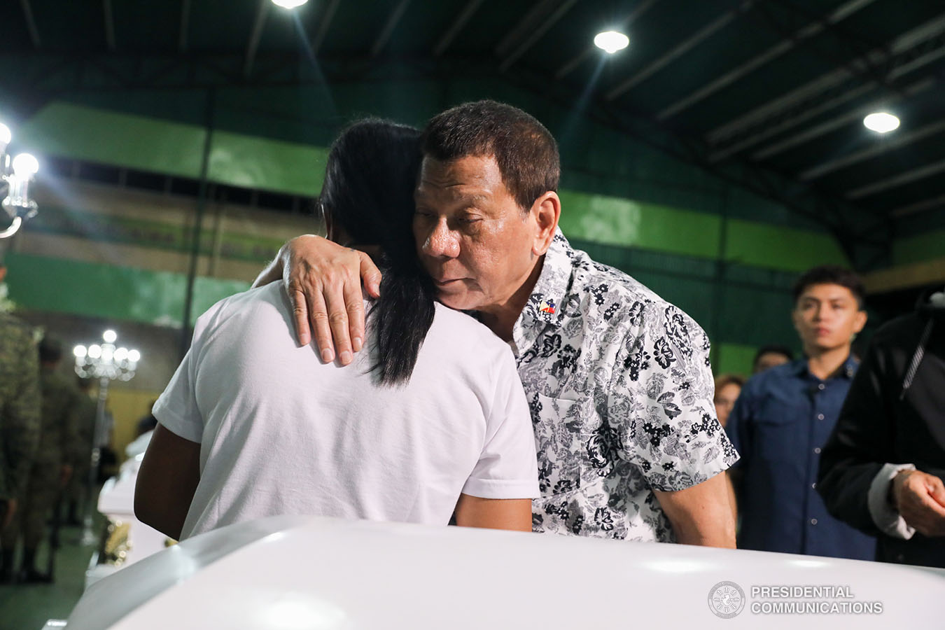 President Rodrigo Roa Duterte condoles with the kin of one of the slain soldiers he visited at Camp General Vicente Lukban in Catbalogan City in Samar on November 15, 2019. ALBERT ALCAIN/PRESIDENTIAL PHOTO