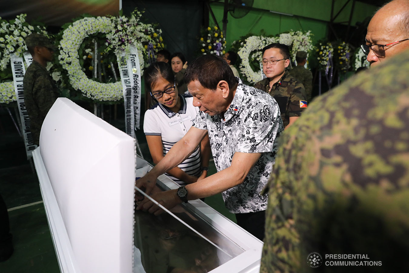 President Rodrigo Roa Duterte posthumously awards the Order of Lapu-Lapu Rank of Kalasag to one of the slain soldiers he visited at Camp General Vicente Lukban in Catbalogan City in Samar on November 15, 2019. ALFRED FRIAS/PRESIDENTIAL PHOTO