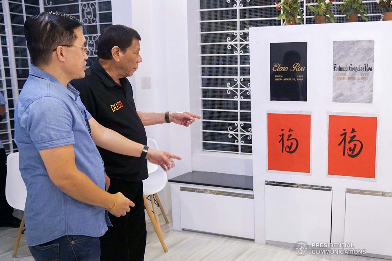 President Rodrigo Roa Duterte visits the graves of his dearly departed at the Roman Catholic Cemetery in Davao City on October 31, 2019. With the President is Senator Christopher "Bong" Go. ARMAN BAYLON/PRESIDENTIAL PHOTO