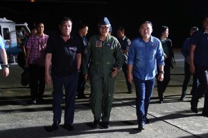 President Rodrigo Roa Duterte prepares to board a plane bound for the Kingdom of Thailand at the Tactical Operations Group 11 in Davao City on November 1, 2019. With the President is Senator Christopher "Bong" Go. JOEY DALUMPINES/PRESIDENTIAL PHOTO