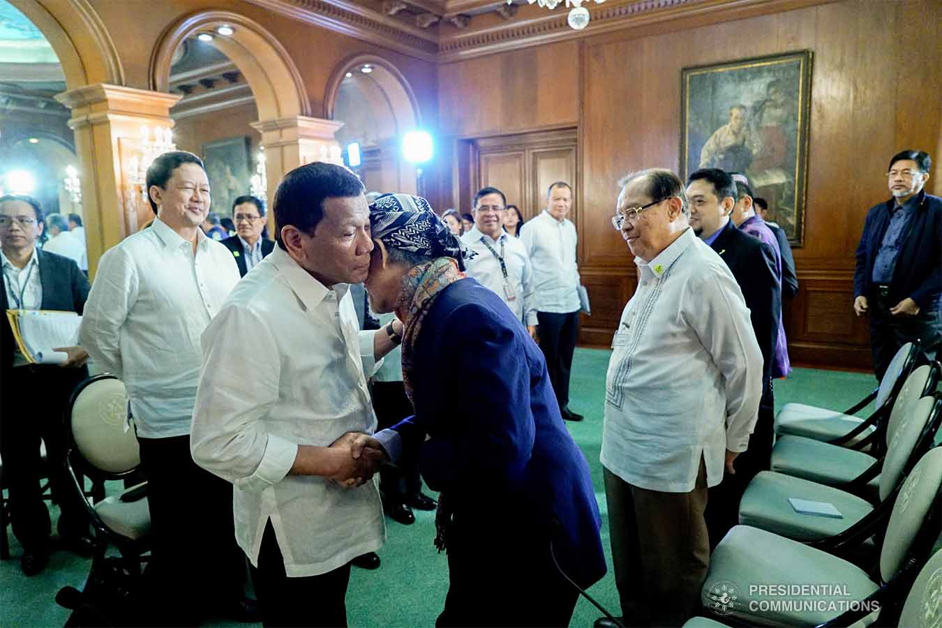 President Rodrigo Roa Duterte gives a warm welcome to Moro National Liberation Front Founding Chairman Nur Misuari at the Malacañan Palace on November 11, 2019. KING RODRIGUEZ/PRESIDENTIAL PHOTO