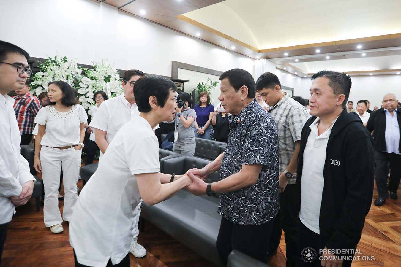 President Rodrigo Roa Duterte condoles with the bereaved family of Elizabeth Gokongwei as he visits the wake at the Heritage Memorial Park in Taguig City on November 17, 2019. VALERIE ESCALERA/ PRESIDENTIAL PHOTO