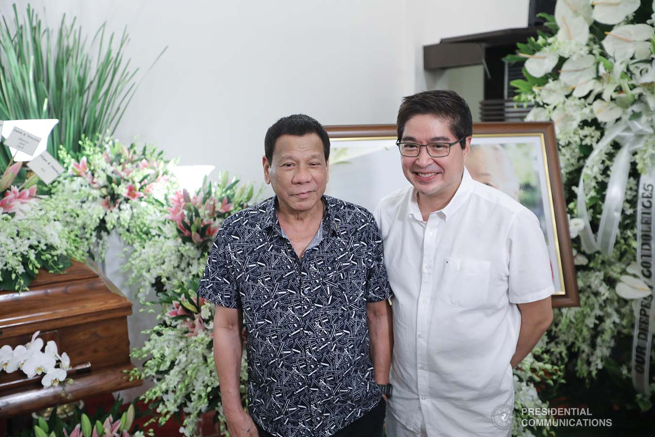 President Rodrigo Roa Duterte has his photo taken with Lance Gokongwei during his visit to condole with the bereaved family of Elizabeth Gokongwei at the Heritage Memorial Park in Taguig City on November 17, 2019. VALERIE ESCALERA/ PRESIDENTIAL PHOTO