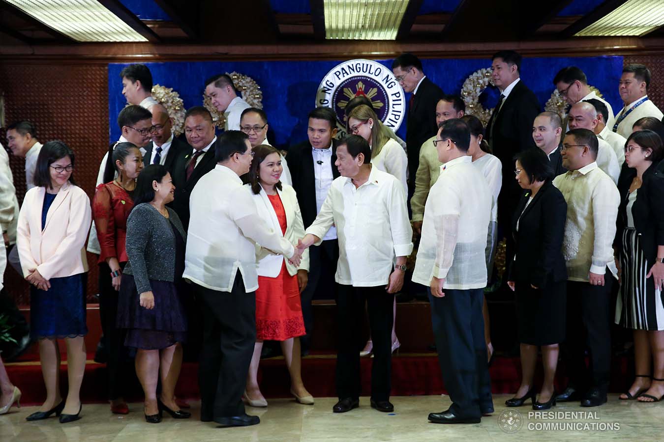 President Rodrigo Roa Duterte greets one of the newly-appointed government officials during their oath-taking ceremony at the Malacañan Palace on December 3, 2019. ALBERT ALCAIN/PRESIDENTIAL PHOTO