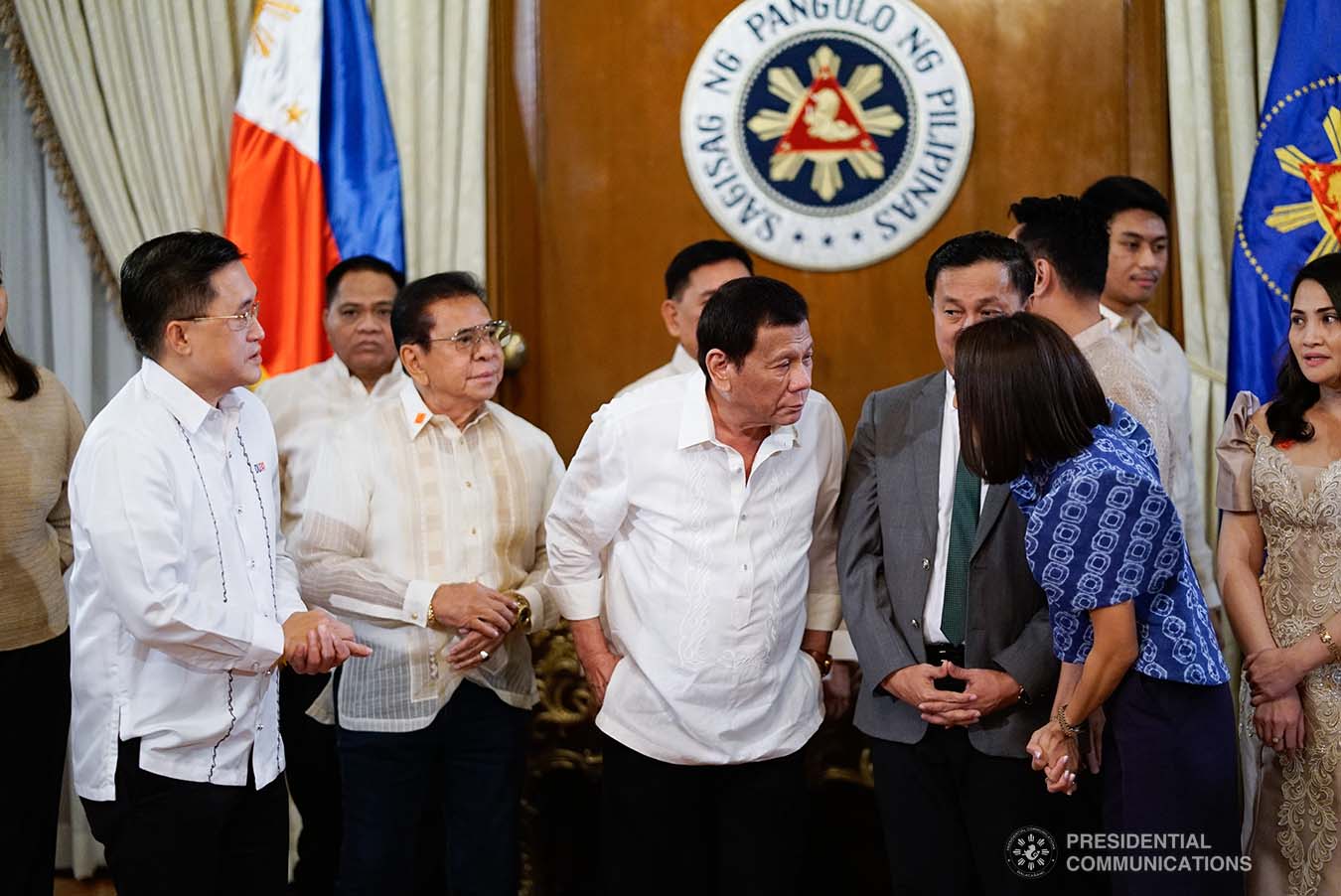 President Rodrigo Roa Duterte chats with one of the newly-elected officers of the League of Municipalities of the Philippines following their oath-taking ceremony at the Malacañan Palace on December 3, 2019. KING RODRIGUEZ/PRESIDENTIAL PHOTO
