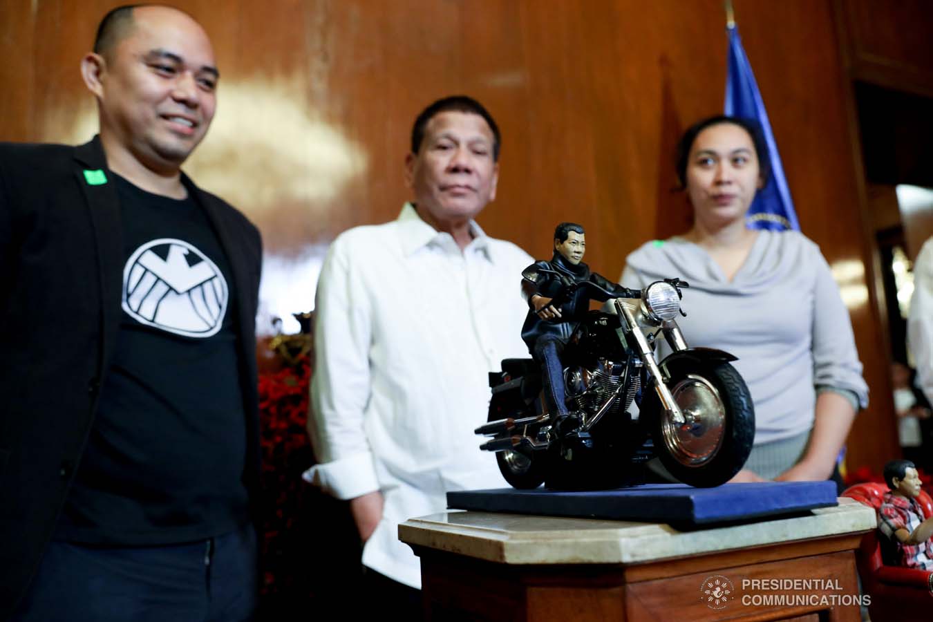 President Rodrigo Roa Duterte receives miniature dolls from toymaker Dennis Mendoza during their meeting at the Malacañan Palace on December 9, 2019. ROBINSON NIÑAL JR./PRESIDENTIAL PHOTO