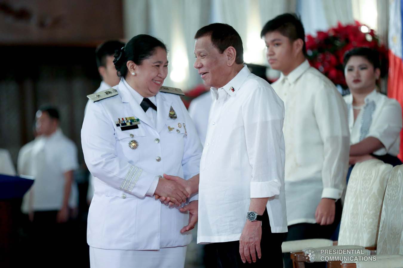 President Rodrigo Roa Duterte shares a light moment with newly promoted Jail Chief Superintendent Amelia Rayandayan during the oath-taking ceremony at the Malacañan Palace on December 10, 2019. SIMEON CELI JR./PRESIDENTIAL PHOTO
