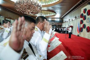 President Rodrigo Roa Duterte administers the oath of office to the newly-appointed flag officers of the Armed Forces of the Philippines and star-ranked officers of the Philippine National Police at the Malacañan Palace on December 9, 2019. REY BANIQUET/PRESIDENTIAL PHOTO
