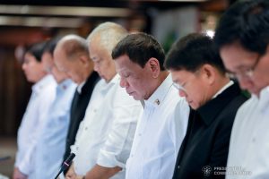 President Rodrigo Roa Duterte bows his head in prayer prior to the start of the joint Armed Forces of the Philippines-Philippine National Police (AFP-PNP) Command Conference at the Malacañan Palace on December 9, 2019. KARL NORMAN ALONZO/PRESIDENTIAL PHOTO